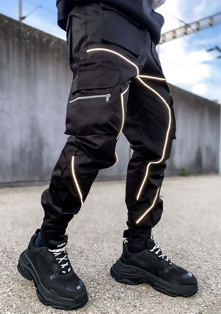 Pantalones de nylon de secado rápido de los pantalones de nylon del cargo de los hombres reflexivos del diseño de la tira del fabricante del OEM