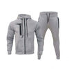 Trajes personalizados profesionales Color sólido Zip Up Coodie Joggers Sets Men Dos piezas Sweatsuit