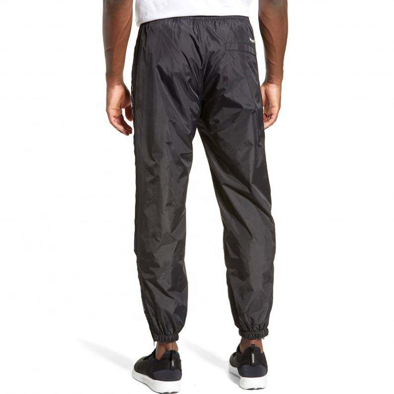 OEM Manufacturer Wholesale Custom 100%Nylon Men Clothing Track Pants Black Windbreaker Pants