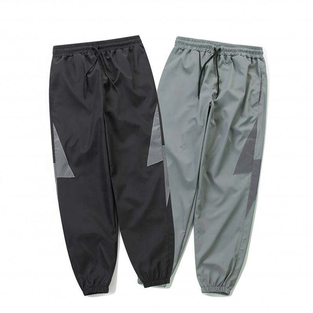 OEM Manufacturer Wholesale Men Loose Casual Pants Custom Logo Windbreaker Reflective Nylon Custom Pants